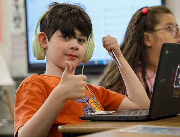 Clark County School Choice and Open Enrollment student with thumbs up